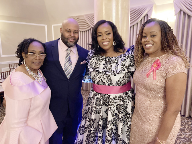 Pastor Monique K. Newkirk (third from left) poses with her aunt, Pastor Dollyann Newkirk, brother Bobby Newkirk, Jr., and sister Shawna Newkirk-Reynolds at her Third Pastoral Anniversary.