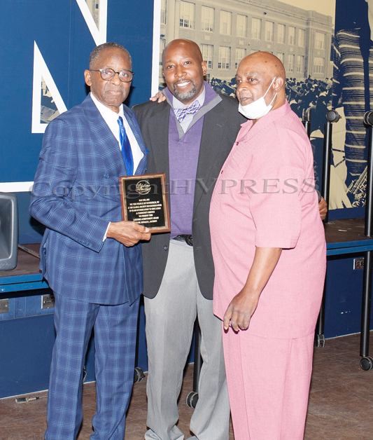 Da’Ron Wilson, center, and Donald Fryer, right, present Dr. Jackson with a Lifetime Achievement Award on Monday, May 2, 2022 as Dr. Ronald L. Jackson was celebrated for his 50 years of service to education and community. Hudson Valley Press/CHUCK STEWART, JR.