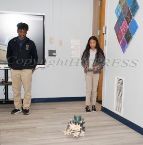 Fifth-grader Victoria Sanchez built and programmed the robot which delivered commemorative ornaments to guests on May 5, 2022, as San Miguel Academy of Newburgh dedicated the Sister Agnes Boyle, O.P. STEAM Learning Center. HUDSON VALLEY PRESS/ Chuck Stewart, Jr.