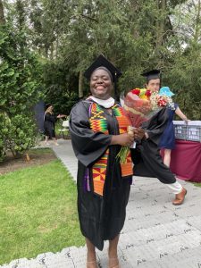 Vassar College 2022 graduate, Onyinyech Praise Attah, smiles big following receiving her diploma at Sunday’s 158th Commencement.