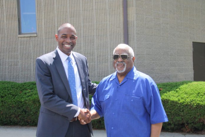 Lt. Gov. Antonio Delgado and Reverend Bottoms pose for a photo following the summit.