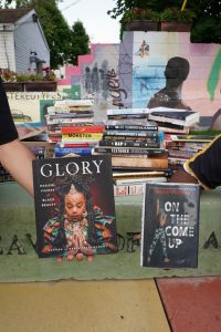 Pictured are some of the many books that have been donated so far to be included in the up- and-coming Black Library which is now being compiled and tentatively slated to appear in Monticello on Broadway. Also being used as a community arts space, the project is being led by two Monticello natives and artists, Douglas Shindler and Michael Davis, and will celebrate black culture and history. Photo credit: Samantha Monroy
