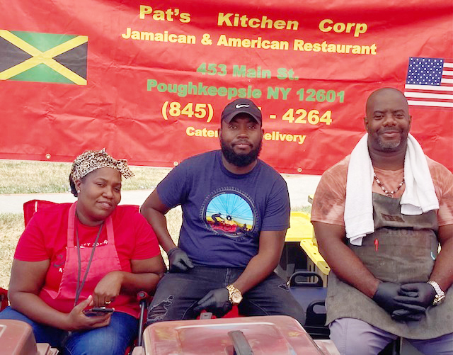 Pat’s Kitchen Corp, located in Poughkeepsie, was one of several vendors serving up delicious, ethnic food at Sunday’s Beacon Farmer’s Market. From left are; Karen, Shaun and Donton, all in their second year at the Market and each loving the weekly experience.