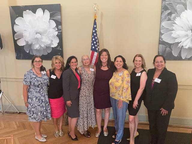 Nominees for the 41st Senate District 2022 Woman of Distinction surround Senator Sue Serino at Wednesday’s event.