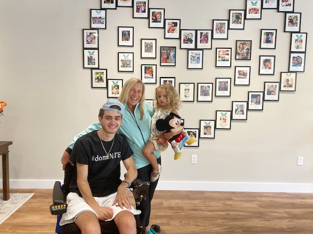 From left are; Nate Morse, Angels of Light Co- founder Lori Cassia-Decker and her granddaughter Gia in the life- altering, 20 year old non- profit’s brand new space, located in Millbrook.