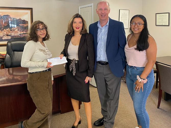 Leora Turner (left) receiving the Scholarship Check at LoBiondo Law Offices. L-R: Attorney Juliana LoBiondo, Attorney Anthony LoBiondo, and Bilingual Accounts Manager Citlaly Garcia. Photo: Juliana LoBiondo
