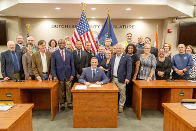Dutchess County Executive Marcus Molinaro, DCC Board Chair Michael Francis Dupree, DCC President Peter Grant Jordan and DUE President Werner Steger were joined by Dutchess County Legislature Chair A. Gregg Pulver and DCC faculty and staff for a signing ceremony on Wednesday, September 21.