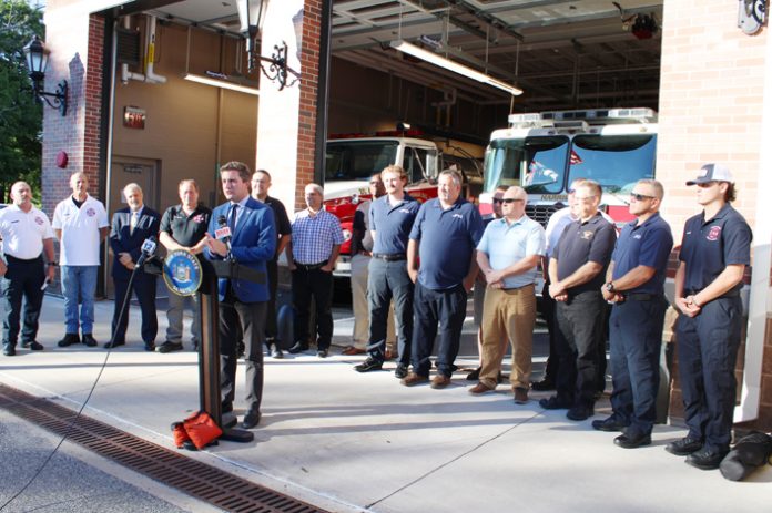 Firefighters from Monroe, Minisink, Pine Island, Warwick, and Woodbury, as well as EMTs from New Windsor and Cornwall, join Senator James Skoufis (D-Hudson Valley) at Harriman Engine Co.
