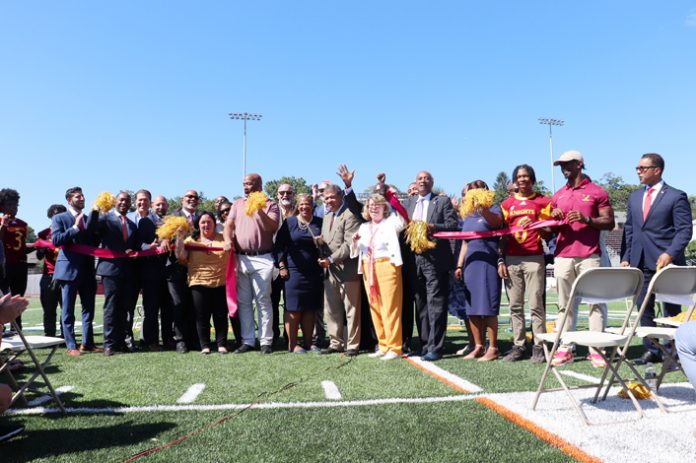 The ribbon is officially cut on the new Memorial Field.