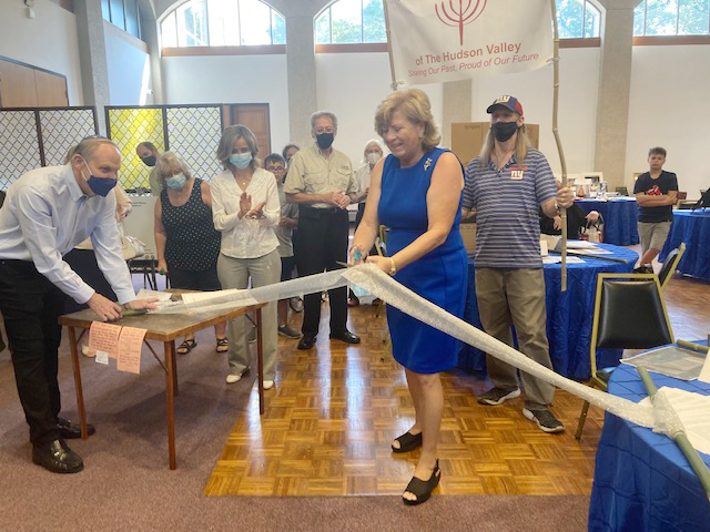Mimica Tsezana Hyman, who had the idea to bring the first Jewish Museum to the Hudson Valley, cut the ribbon at Sunday’s Pop-up Museum and Cultural Festival, held at Newburgh’s Kol Yisrael.