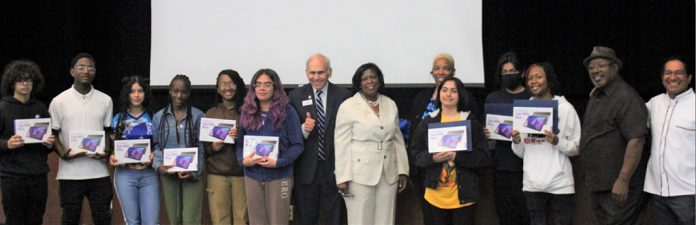 Ten Poughkeepsie High School seniors, who have demonstrated dedication to their school work, were each presented with a new, personal tablet on September 15 during a brief ceremony in the school auditorium.