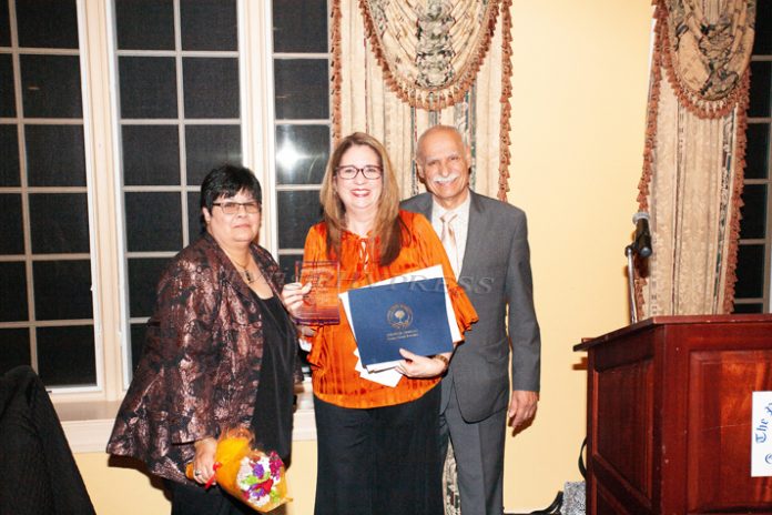 2022 De Hoy Awardee Annette Marzan, center, with Joanne Lugo and Peter Gonzalez. Marzan was honored and received several citations as Latinos Unidos of the Hudson Valley celebrated its 20th Anniversary and its 16th Annual Hispanic Heritage Cultural Celebration on Friday, October 21, 2022 at the Powelton Club. HUDSON VALLEY PRESS/ Chuck Stewart, Jr.