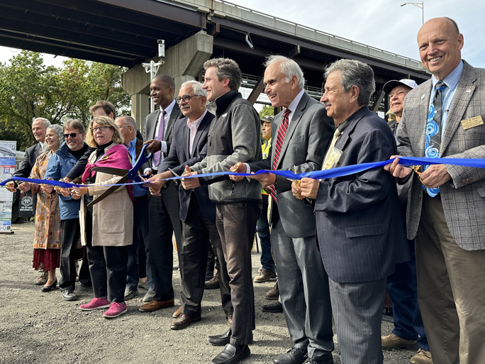Lieutenant Governor Antonio Delgado helps cut the ribbon on Friday marking the substantial completion of the full deck replacement project and the full reopening of the north (westbound) span of the Newburgh-Beacon Bridge.