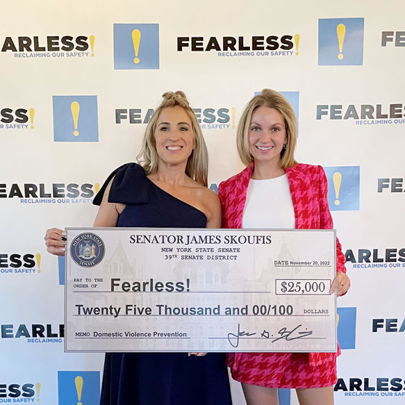 Skoufis’ Chief of Staff, Christie Foster, right, presents $25,000 in domestic violenec prevention funding to Fearless! Executive Director Kellyann Kostyal-Larrier at the organization’s November 20th brunch.