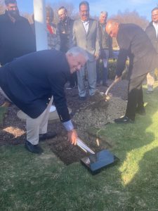 Executives of the Walden Savings Bank bury a time capsule, assembled with objects of the times by bank employees. The capsule was buried Tuesday afternoon, outside  of the Scott’s Corners, Montgomery branch and will be unearthed on April 25, 2072.