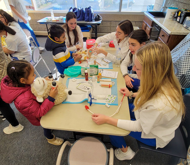 Mount Saint Mary College’s Fuzzy Friends clinic teaches youngsters about medical care. Photo: Linda Kelly