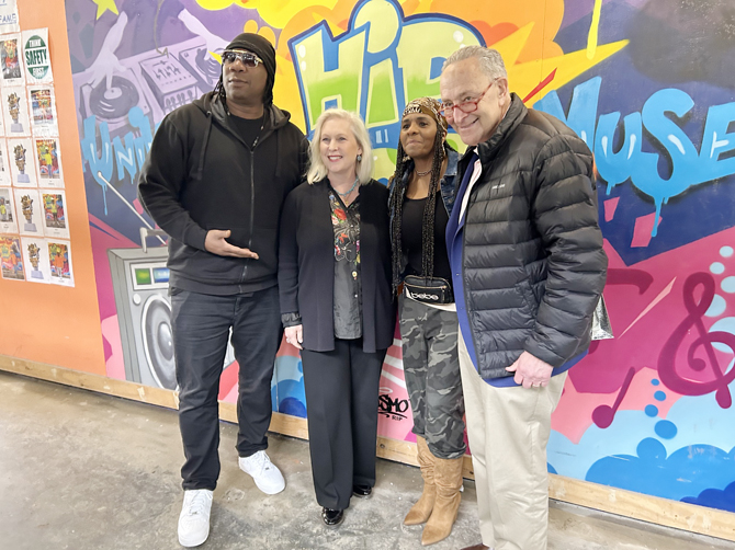 U.S. Senator Kirsten Gillibrand (second from left), Majority Leader Chuck Schumer (far right), and Congressman Jamaal Bowman, and Hip Hop legends announce $5 million for The Universal Hip Hop Museum to celebrate and preserve Hip Hop in the heart of the community where it was founded. Leaders were joined by major artists including KRS-One (pictured, far left ), G. Simone, Roxanne Shanté, Grandmaster Flash, Eric B., Grand Wizzard Theodore.