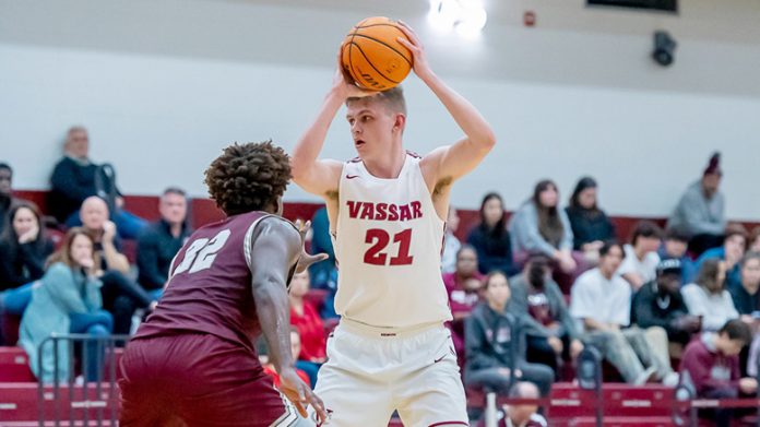 The Vassar College men’s basketball team came-from-behind early for a 72-64 win over Bard College pictured above is Vassar Brewers’ Case Parsons.