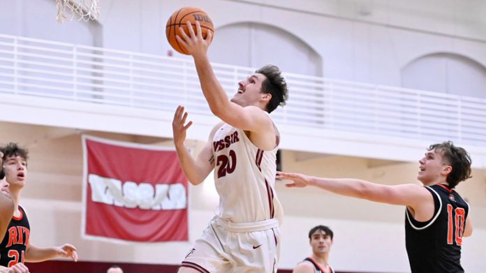 Senior Jack Rothenberg’s old fashioned three-point play with 27 seconds left in regulation propelled the Vassar College Men’s Basketball team to a 69-65 come-from-behind victory over the Rochester Institute of Technology. Photo: Carlisle Stockton
