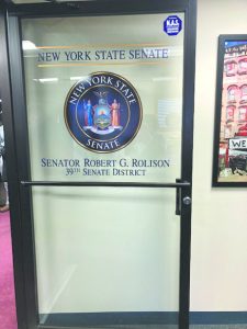 Pictured is the front door to the new 3 Neptune Road, Town of Poughkeepsie office for 39th District Senator, Rob Rolison. It’s official Ribbon-Cutting and Opening took place at the site Thursday afternoon in front of a large, supportive crowd.