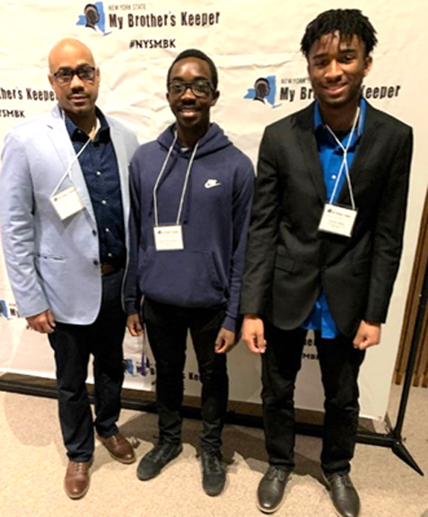 My Brother’s Keeper (MBK) fellows Keenan Wood, Jameel Richardson Jr, and mentor and PHS school counselor Jason Conrad traveled to Albany for the MBK Stand and Deliver Leadership Showcase.