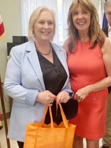 On left, United States Senator, Kirsten Gillibrand, stands with AnnMarie Maglione, Director of Orange County Office for the Aging, following Gillibrand’s outlining of her 5-Point Master Plan on Aging, ensuring every American can age with dignity and financial security.