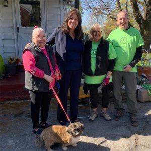 A Poughkeepsie homeowner served in 2022 with former Senator Sue Serino and project volunteers.