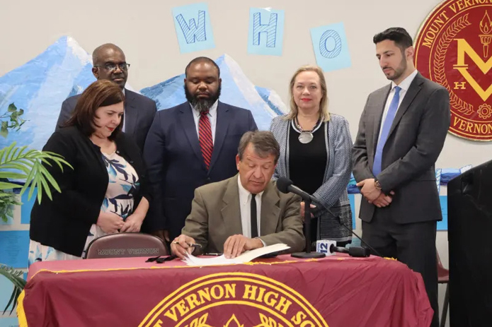 George Latimer signs a bill into law that will require candidates for County Legislator and County Executive to complete a Candidate Disclosure form.