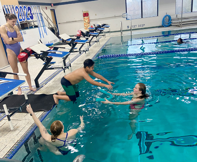 The Mount Saint Mary College swim team hosts students from Newburgh’s San Miguel Academy for swimming lessons at the Kaplan Center Pool recently.