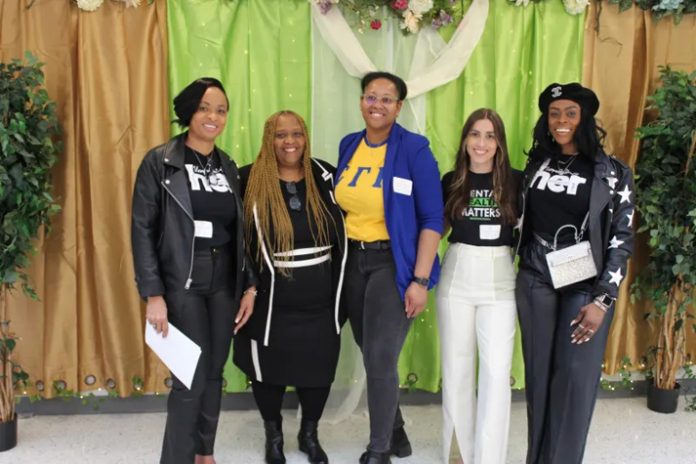 Women from Mount Vernon gathered in the Mount Vernon High School cafeteria for a night of Helping Everyone Rise (H.E.R.) on Friday, March 31, 2023.