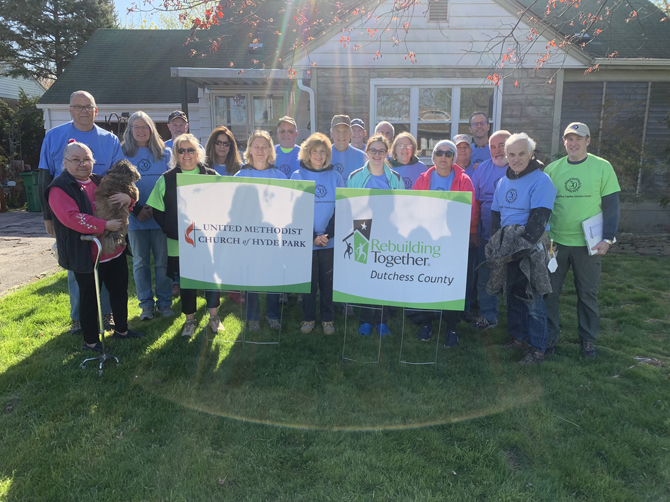 Volunteers from United Methodist Church of Hyde Park with the homeowner they served on National Rebuilding Day 2022.