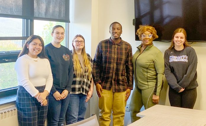 Giselle Martinez (far left) spoke with Mount Saint Mary College students about her experience working on the Newburgh City Council.