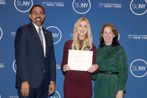 SUNY Ulster announced Arianna Moore (center) of New Paltz, NY as one the recipients of the 2023 State University of New York Chancellor’s Award for Student Excellence.