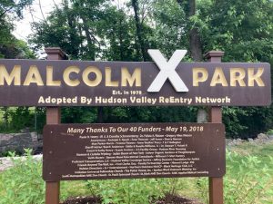 The sign that sits inside the newly reopened Malcolm X Park in the City of Poughkeepsie, detailing all of its dedicated supporters.