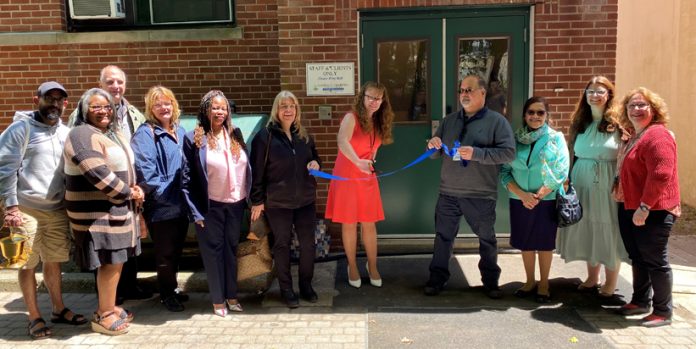 Joined by local officials, agency employees, and other guests, Holly Tanenbaum-Kuttruf, Clinical Director of Residential Services, cut the ribbon for the ceremonial reopening of the newly renovated residential rehabilitation unit at Catholic Charities of Orange, Sullivan & Ulster’s Monticello campus.