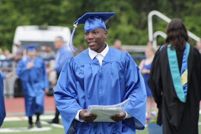 Jaiden Buffong, a Rondout Valley High School graduate, walks proudly after receiving his diploma at graduation on June 23.