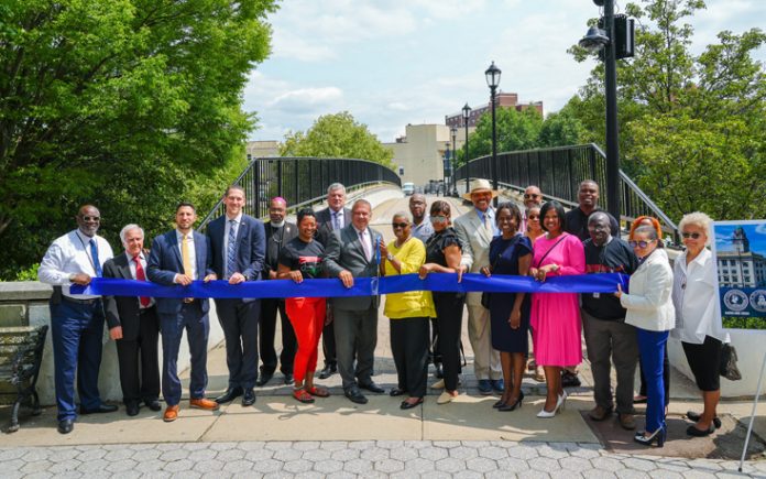 Recently, Yonkers Mayor Mike Spano and the Yonkers City Council re-dedicated the pedestrian bridge that connects Yonkers City Hall to the Cacace Justice Center on Nepperhan Avenue in honor and memory of the City’s first African American Councilman, Joseph E. Burgess Jr. Photo: Maurice Mercado
