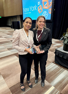 Dutchess County employee Manpreet Kaur Dhaliwal was honored with the 2023 High Impact Leader Award, Dhaliwal stands with Jennifer Lorenz, Acting New York State Chief Information Officer at the NY IT Leadership Forum in Albany.