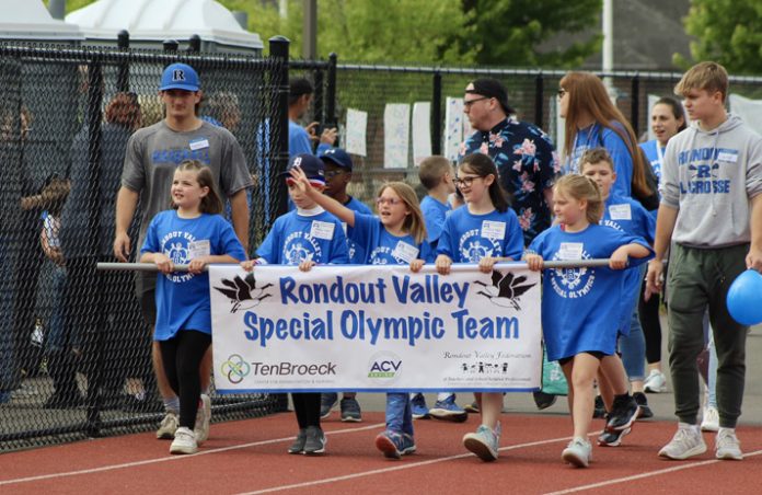 Kerhonkson Elementary School students lead the parade during the opening ceremony of the Rondout Valley Central School District’s Special Olympics event.