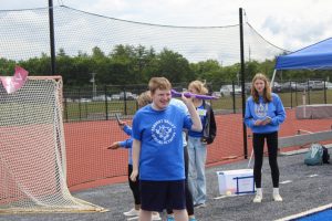 Rondout Valley High School student Randy Davis proudly participates in a throwing competition during the Rondout Valley Central School District’s Special Olympics event on June 9.