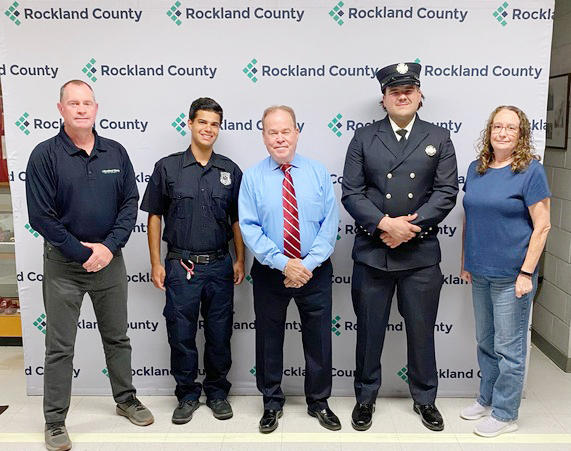 County Executive Ed Day and Fire & Emergency Services Director Chris Kear distributed some of the first college scholarships to emergency responders.