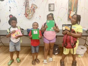 Over 250 book bags and 150 sneakers were provided to City of Newburgh students Saturday at 136 South Street, home of the not- for- profit, M.A.R.C.S Friends, to help get them ready for the approaching school year. 