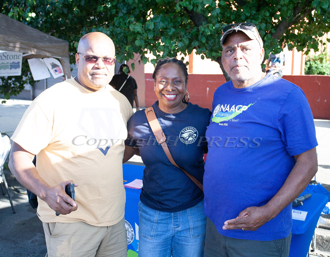 The all-free National Night Out event took place in the City of Newburgh on Tuesday, August 1, 2023. Phil Howard, Dr. ackielyn Manning Campbell and Ray Harvey pose for a photo. Hudson Valley Press/CHUCK STEWART, JR.