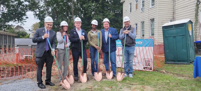 Assemblyman Jacobson, Jaclyn Greenwald, Senator Rob Rolison, Homebuyer Bola, Mayor Nelson, and Board Chair Pete Carr pose for a photo.