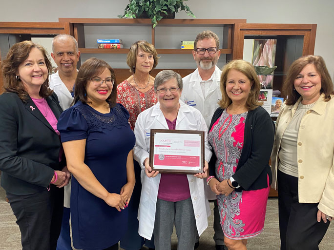 Team members of the Northwell Cancer Institute Westchester Breast Program proudly display and celebrate their new accreditation from The National Accreditation Program for Breast Centers (NAPBC). Photo: Northwell Health