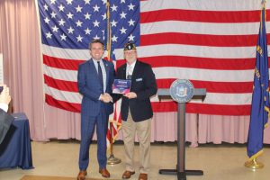 Skoufis Honors US Army Veteran Christopher Holshek with Veterans Hall of Fame Induction. Senator Skoufis presenting Colonel Holshek with Veteran Hall of Fame award plaque.