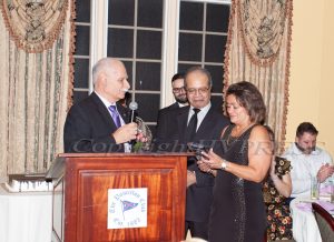 President Peter Gonzalez presents Olga Hernandez with an award for her many years of service as Latinos Unidos of the Hudson Valley hosted its 17th annual Hispanic Heritage Cultural Celebration on Saturday, October 28 at The Powelton Club. Hudson Valley Press/CHUCK STEWART, JR.