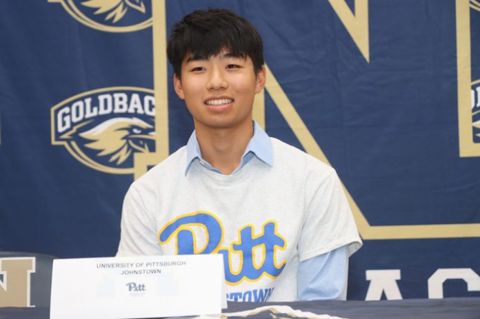 Four scholar-athletes sign national letters of intent to study and compete. Pictured Mark Yan.