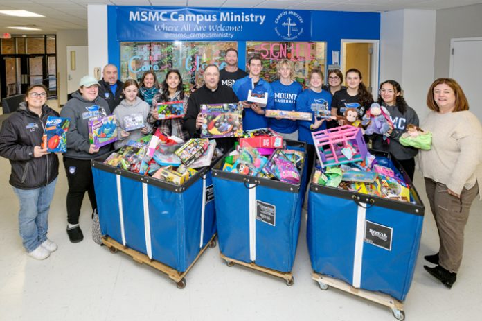 Mount Saint Mary College’s Annual Campus Ministry Toy Drive volunteers load up some of the toys collected on campus on December 12, 2023.