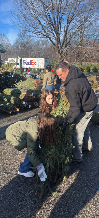 County Executive Neuhaus joins Farmside Acres in Cornwall to provide Trees for Troops this Holiday Season. Approximately 1,800 Christmas trees have been shipped to military families. Pictured above: County Executive Neuhaus with students from Lee Road Elementary School.